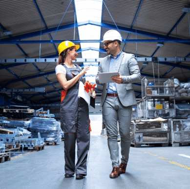 manager-supervisor-industrial-worker-uniform-walking-large-metal-factory-hall-talking-about-increasing-production 1 (2)